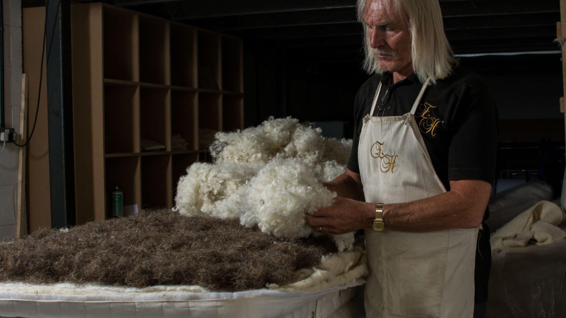 Adding-Wool-To-The-Mattress-By-Hand